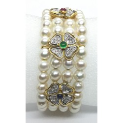 bracciale in oro, rubini, zaffiri, smaraldi, perle e diamanti EURO 1750