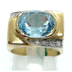 Anello oro, diamanti e topazio azzurro EURO 780