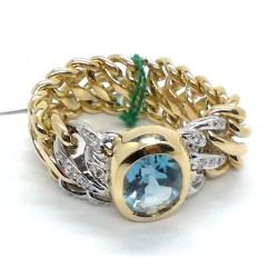 Anello oro, diamanti e topazio azzurro EURO 1520