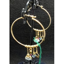 orecchini in oro con smalti e topazio azzurro EURO 580